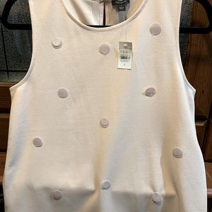 Beautifully designed soft pink sleeveless blouse.